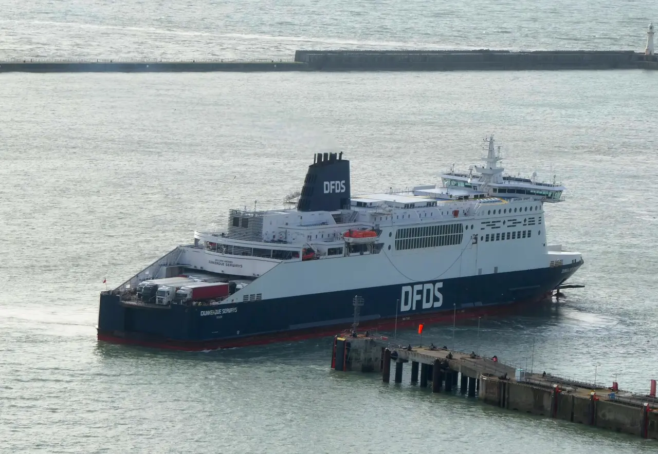 The DFDS ferry Dunkerque Seaways turning in Dover Harbour beside the berths
