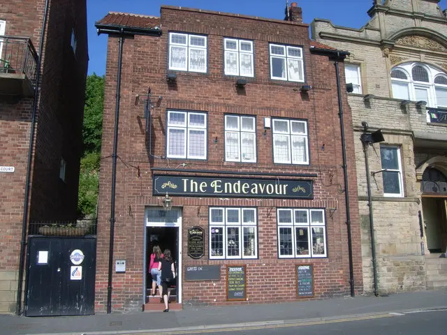 The Endeavour, a three-storey red-brick pub on Church Street with its name in gold letters over the windows