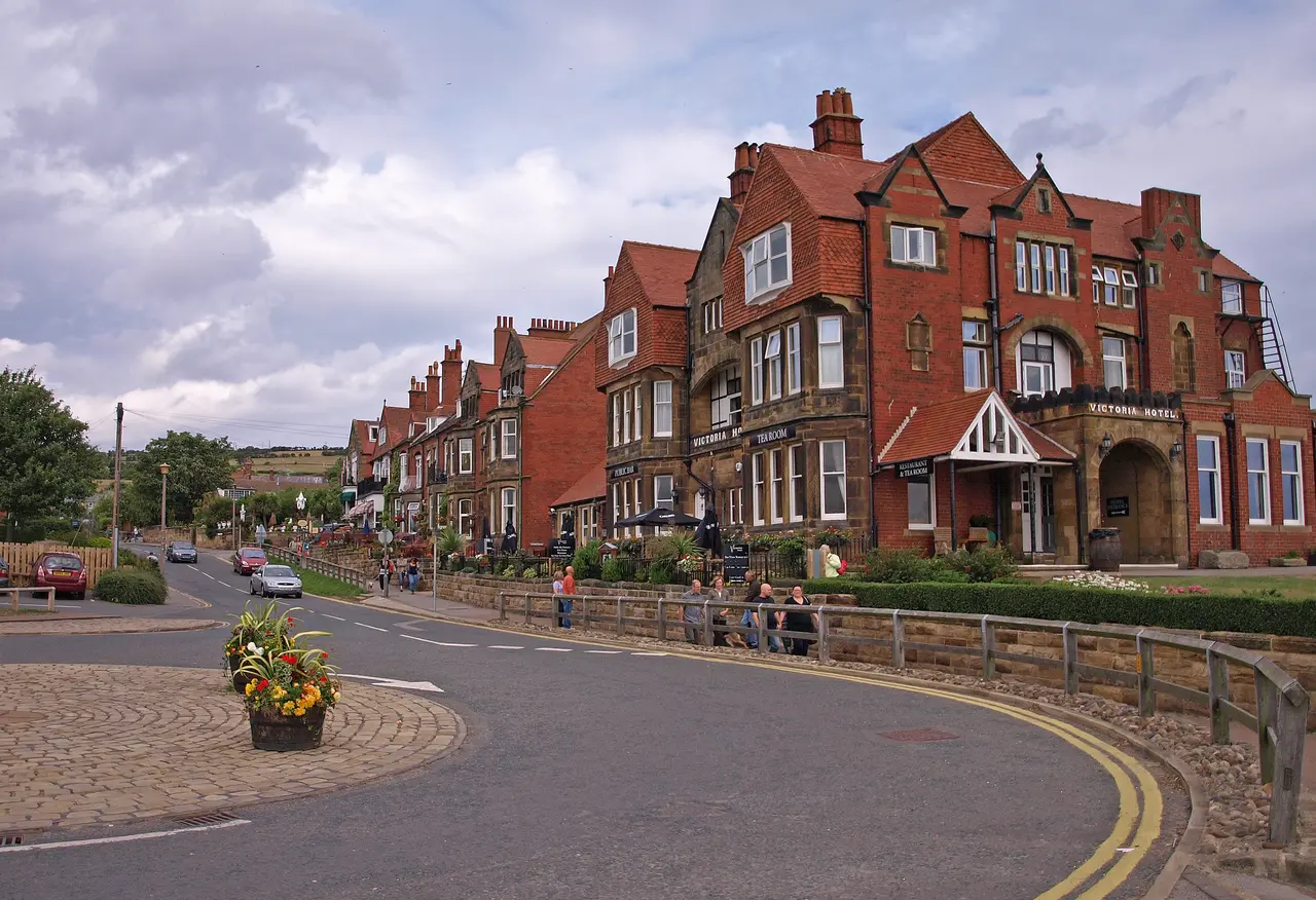 Hotel Victoria, a large red-brick Victorian building on the clifftop at the top of Robin Hood's Bay
